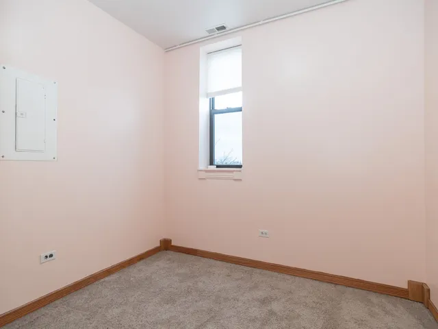 an empty room with window