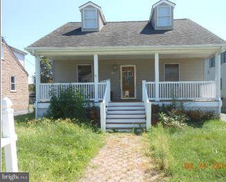 2121 Middleborough Road Baltimore, MD 21221 - Photo 1 of 10 a front view of a house with garden