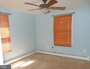 2121 Middleborough Road Baltimore, MD 21221 - Photo 2 of 10 a view of a room with a window and a ceiling fan