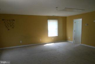 2121 Middleborough Road Baltimore, MD 21221 - Photo 3 of 10 an empty room with a empty space and a window