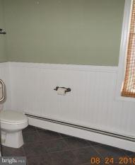 2121 Middleborough Road Baltimore, MD 21221 - Photo 10 of 10 a bathroom with a toilet and a sink