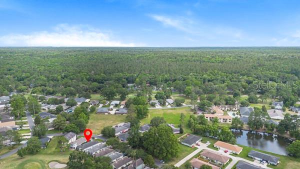 6312 Northwest 109th Place Alachua, FL 32615 - Photo 15 of 17 an aerial view of residential houses with outdoor space and trees