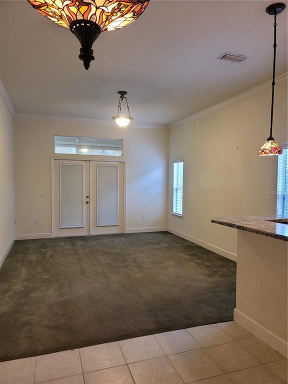 6312 Northwest 109th Place Alachua, FL 32615 - Photo 4 of 17 a view of an empty room and a window