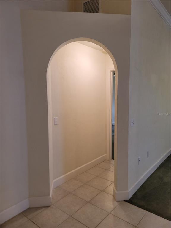 6312 Northwest 109th Place Alachua, FL 32615 - Photo 5 of 17 an empty room with a space