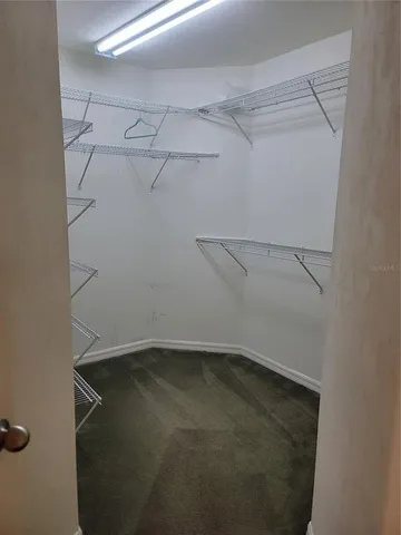 a view of a room with racks on the wall