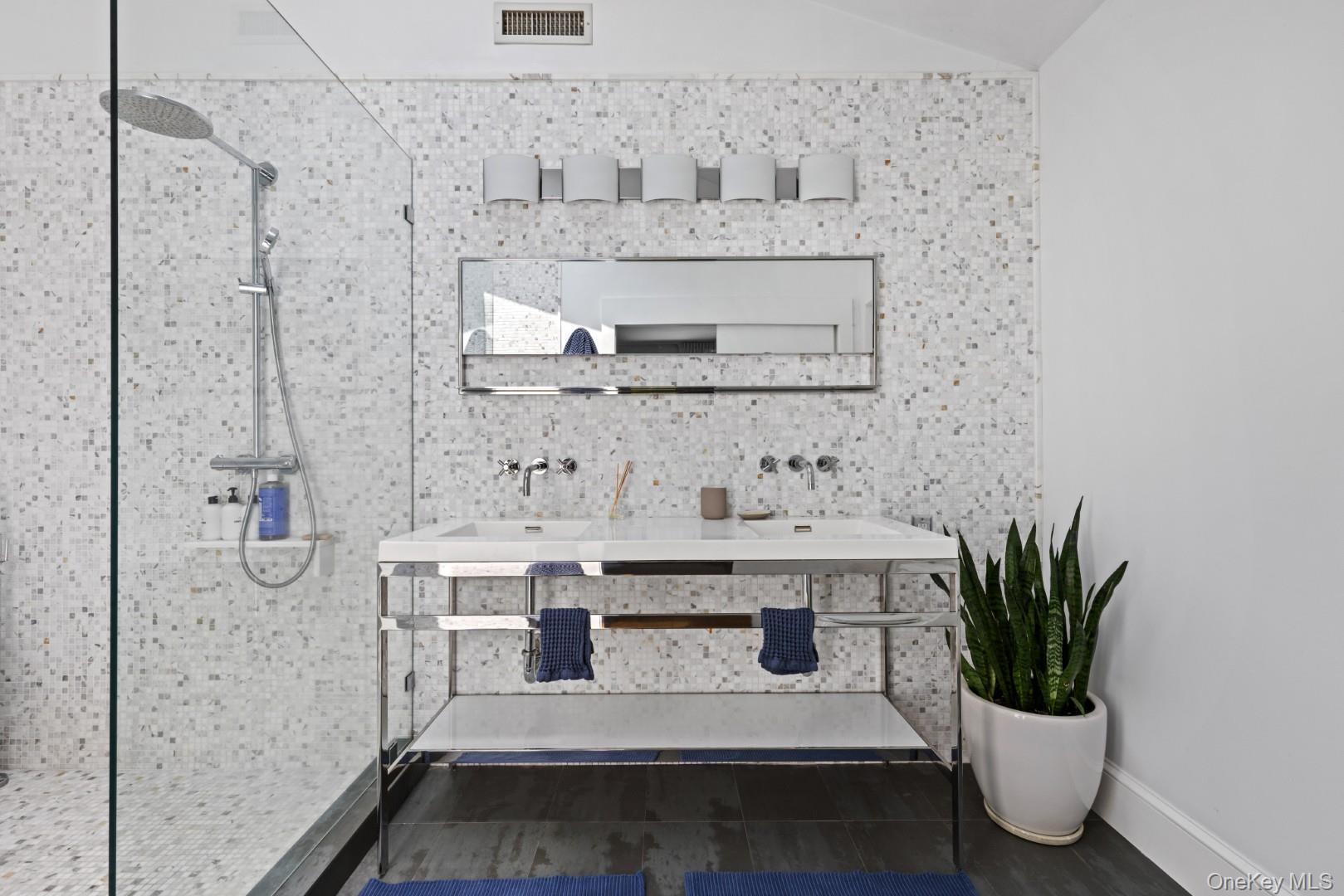 24 Quogue Riverhead Road Quogue, NY 11959 - Photo 17 of 22 a view of bathroom with a sink and mirror