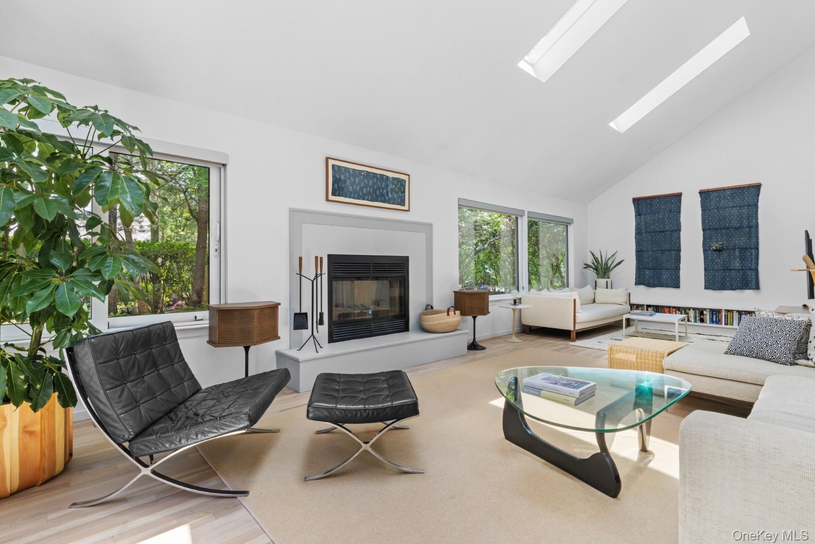 24 Quogue Riverhead Road Quogue, NY 11959 - Photo 4 of 22 a living room with furniture fireplace and window