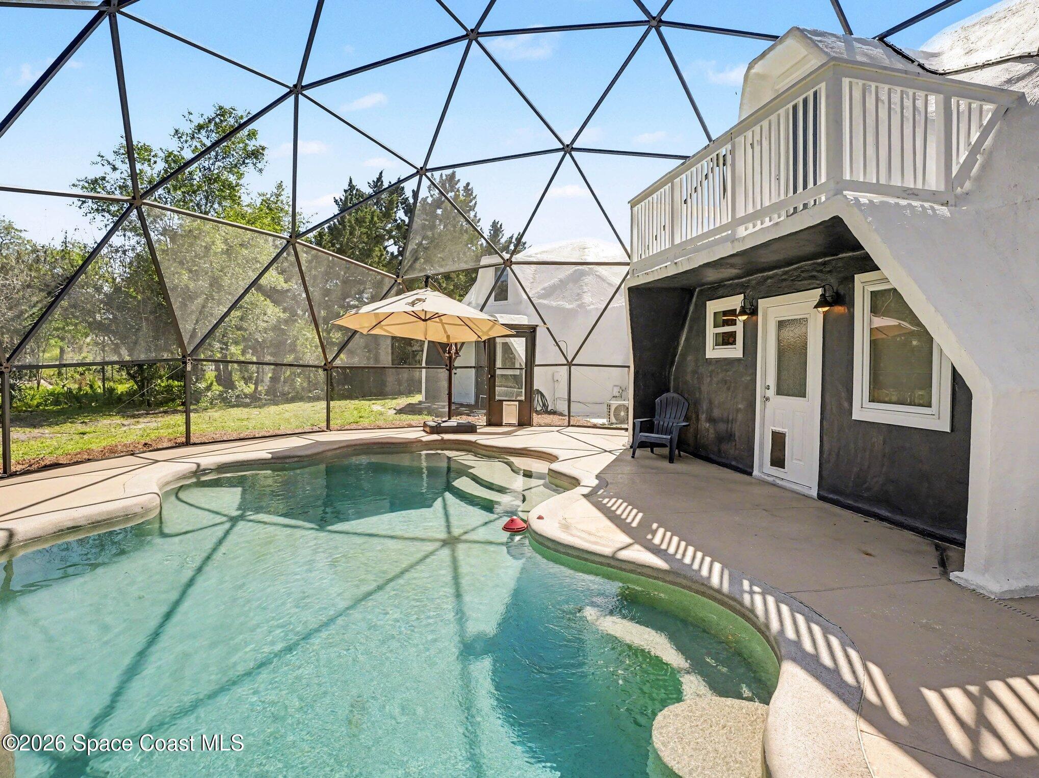 4045 Jake Avenue Cocoa, FL 32926 - Photo 4 of 35 a view of a house with swimming pool