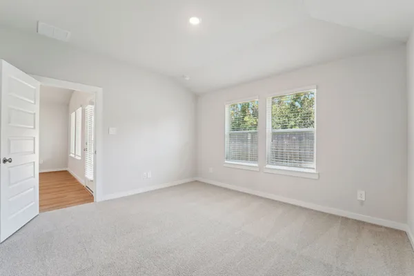 an empty room with windows