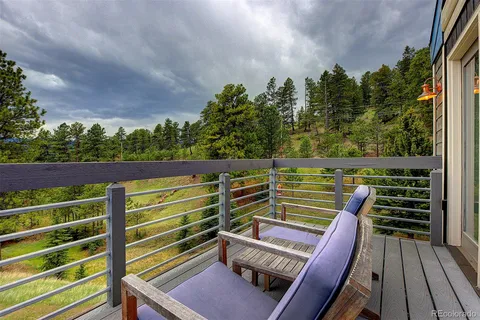 a view of a chairs in a balcony