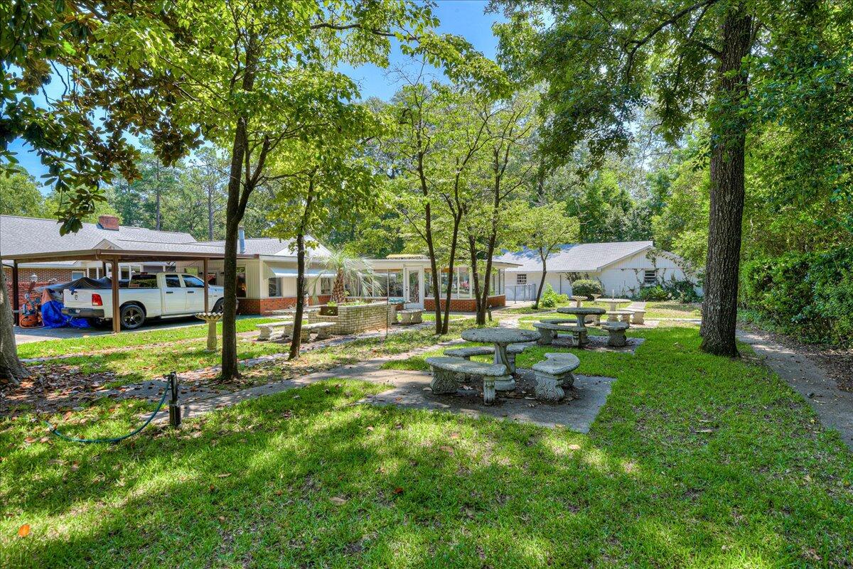 825 Brandy Road Aiken, SC 29801 - Photo 63 of 66 a view of a house with backyard and sitting area