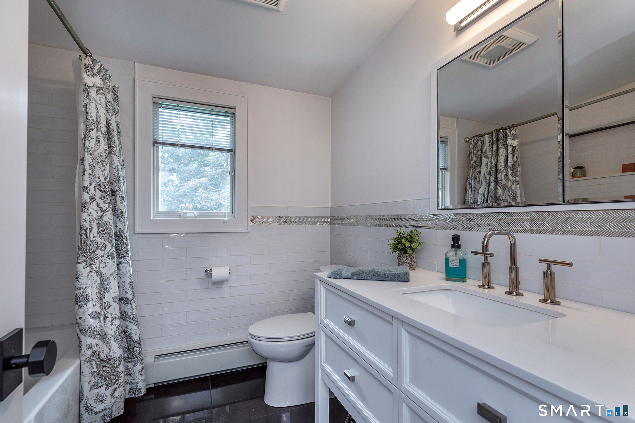 145 Pine Hill Road New Fairfield, CT 06812 - Photo 18 of 35 a bathroom with a sink toilet and vanity