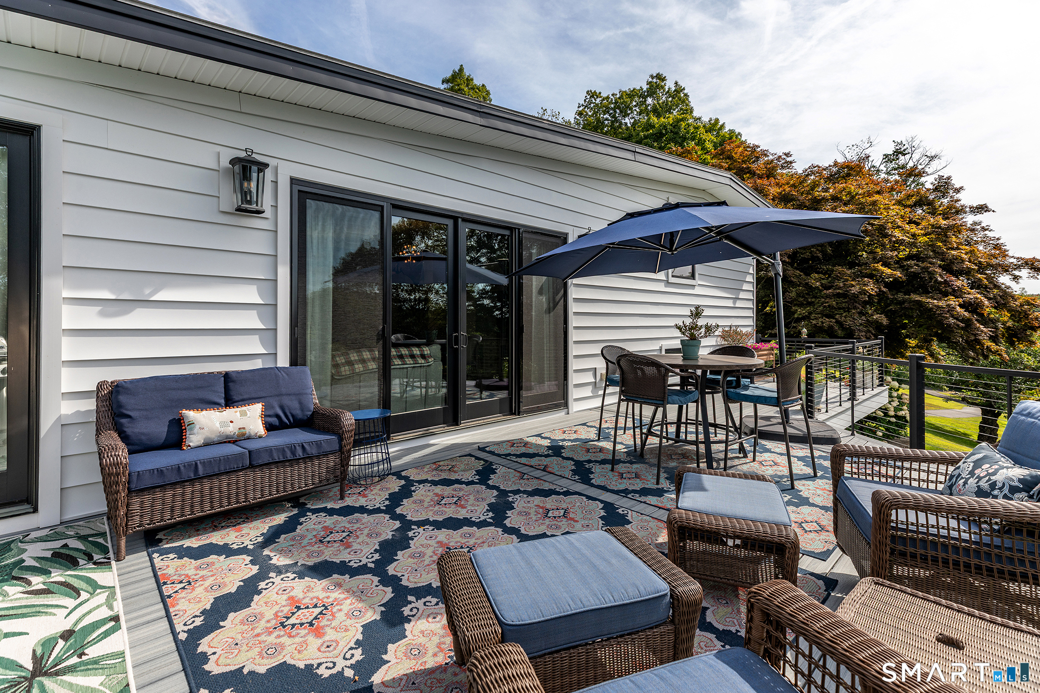 145 Pine Hill Road New Fairfield, CT 06812 - Photo 27 of 35 a outdoor living space with patio furniture and a potted plant