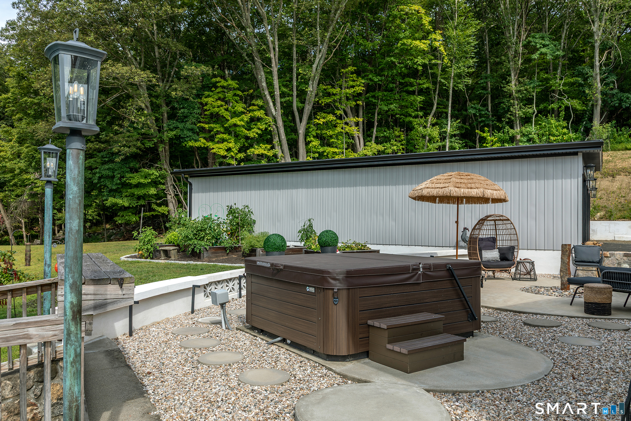145 Pine Hill Road New Fairfield, CT 06812 - Photo 29 of 35 a living room with a couch and a table