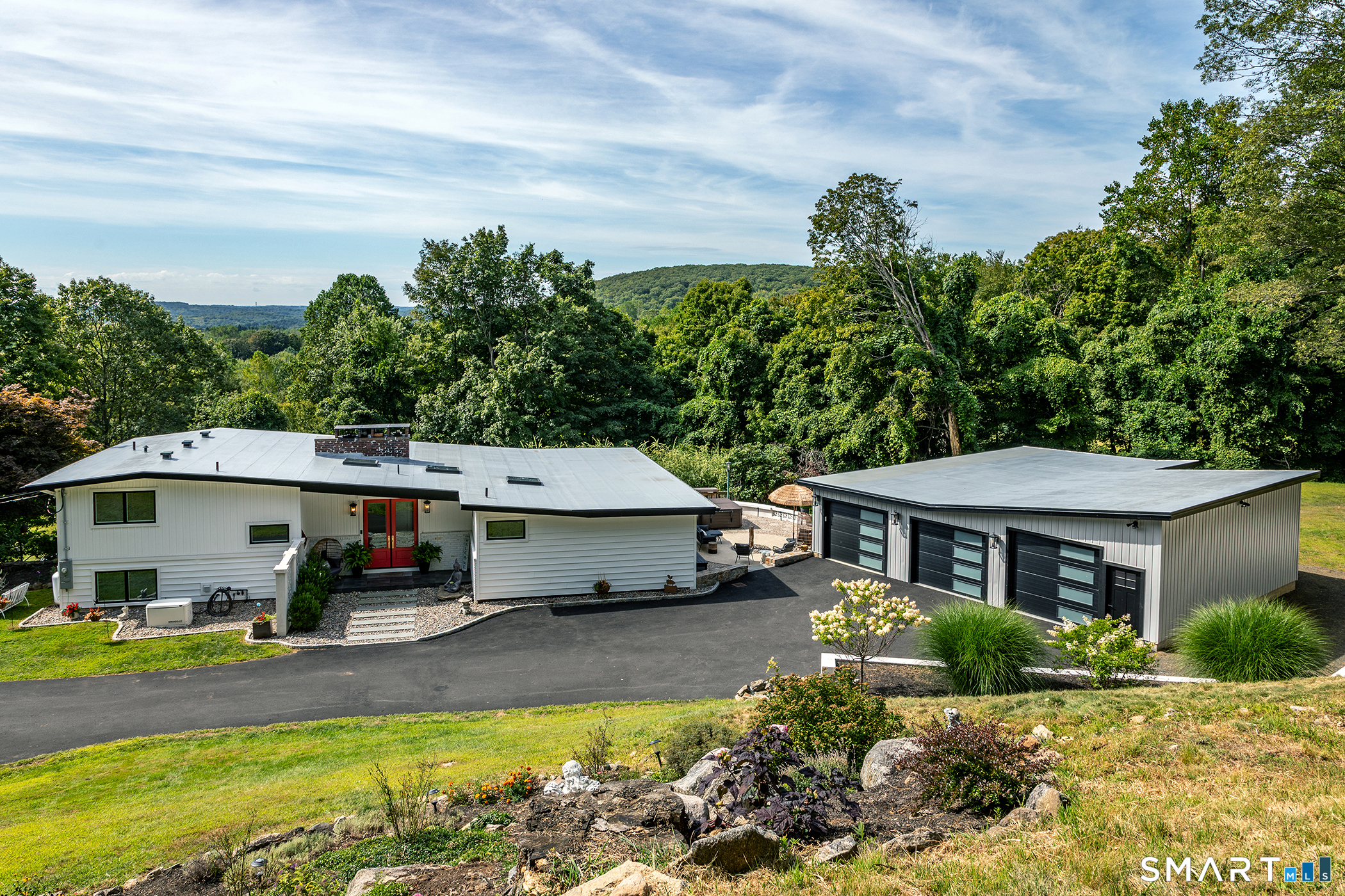 145 Pine Hill Road New Fairfield, CT 06812 - Photo 3 of 35 a view of a house with garden and sitting area