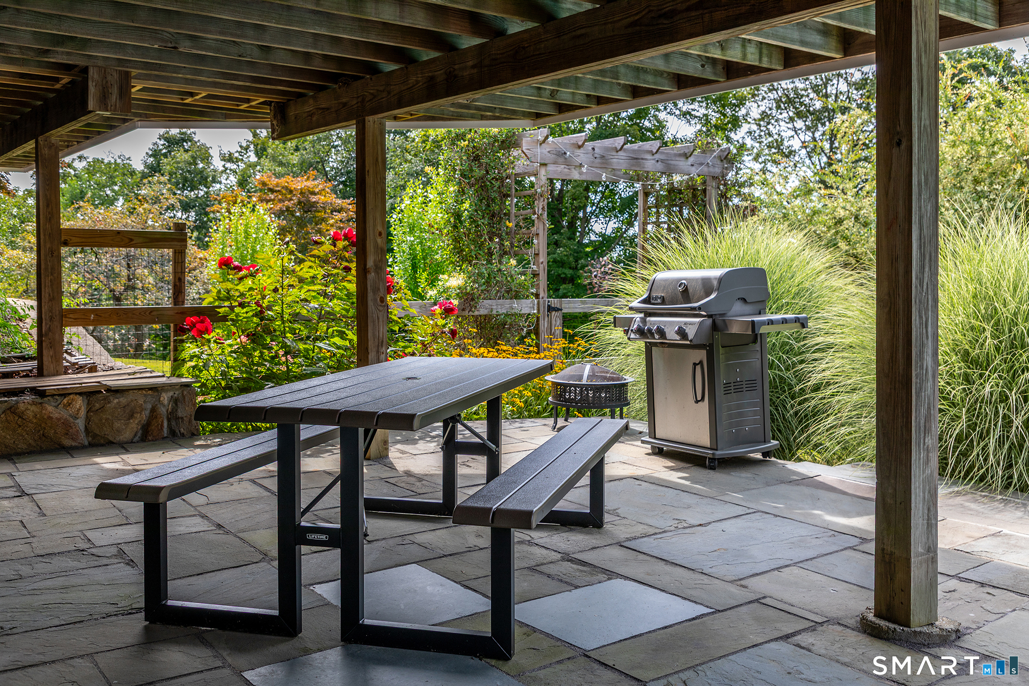 145 Pine Hill Road New Fairfield, CT 06812 - Photo 33 of 35 a table and chairs in a patio