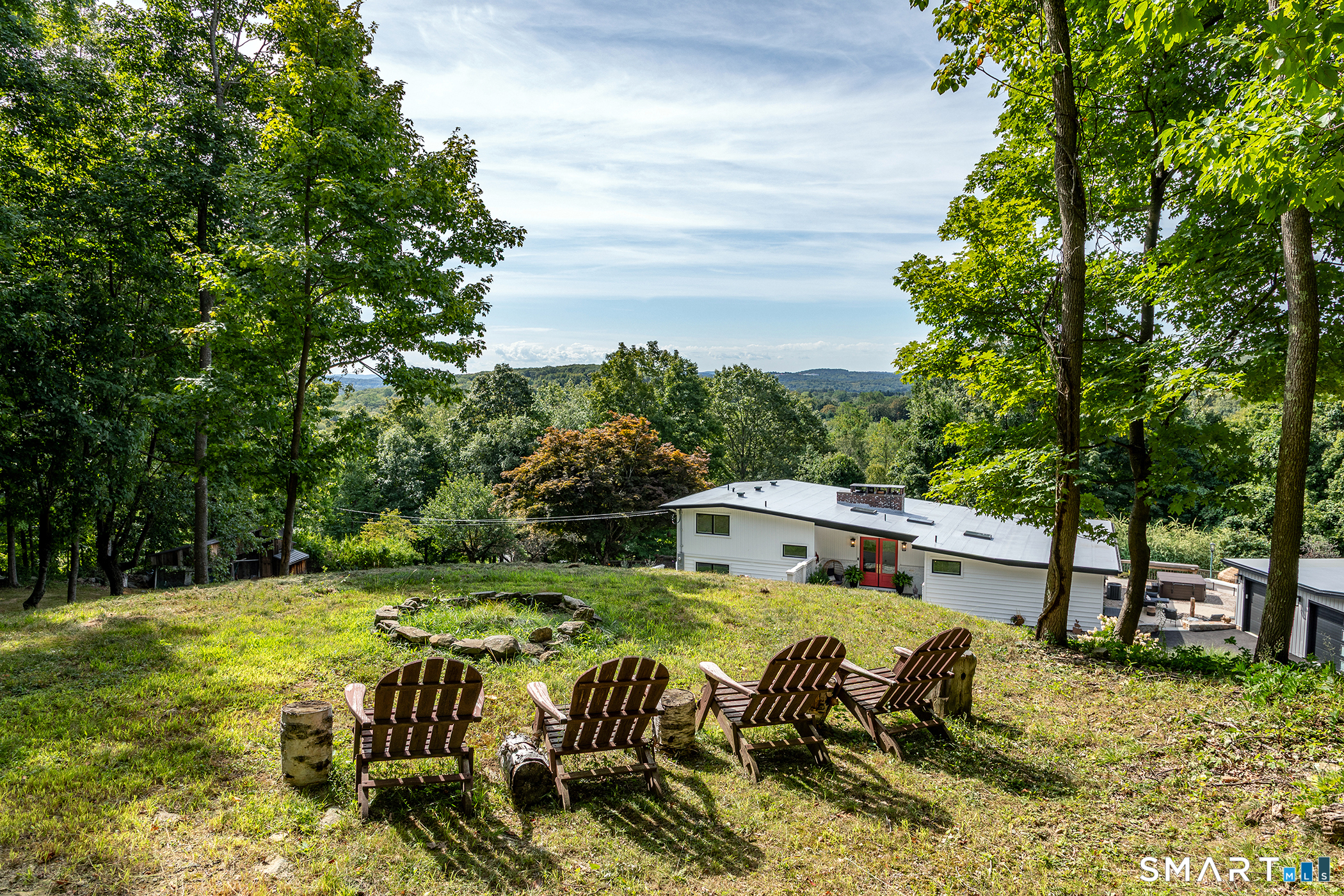145 Pine Hill Road New Fairfield, CT 06812 - Photo 35 of 35 a balcony with table and chairs