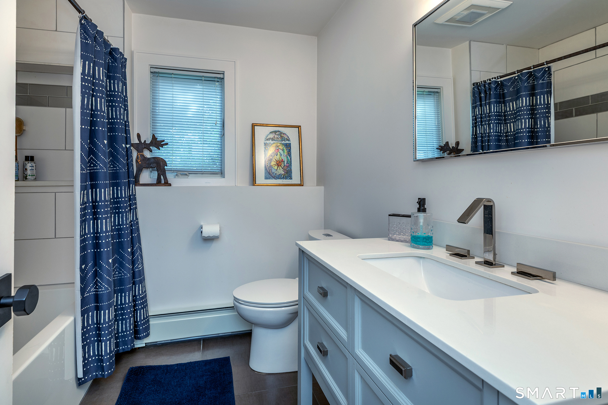 145 Pine Hill Road New Fairfield, CT 06812 - Photo 10 of 35 a bathroom with a sink toilet and shower