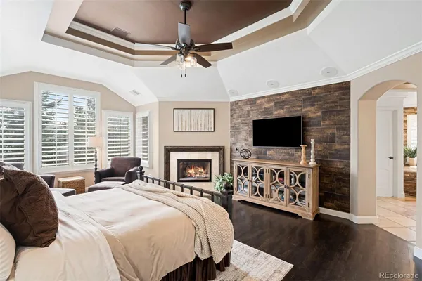a spacious bathroom with a granite countertop tub sink and mirror