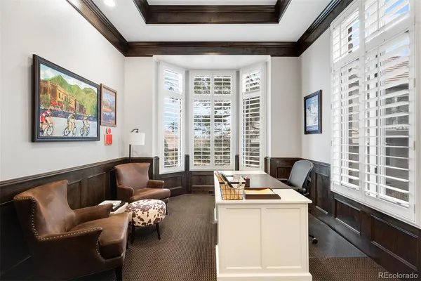 a kitchen with a sink a stove and a refrigerator