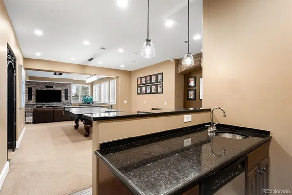 a living room with furniture and a table