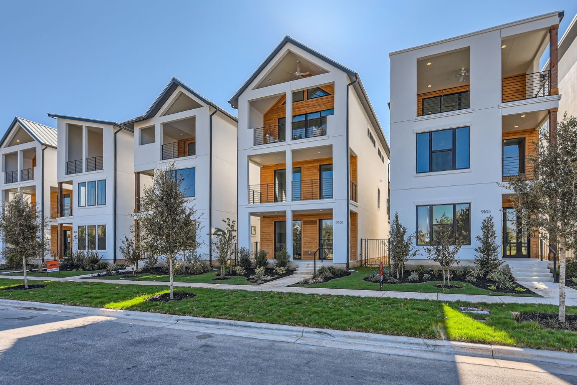 9101 Cattle Baron Path Austin, TX 78747 - Photo 2 of 29 a view of a house with a swimming pool