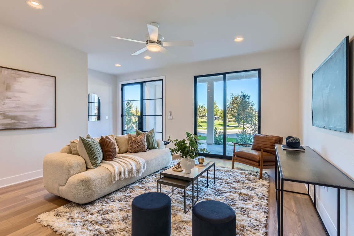 9101 Cattle Baron Path Austin, TX 78747 - Photo 5 of 29 a living room with furniture and a large window