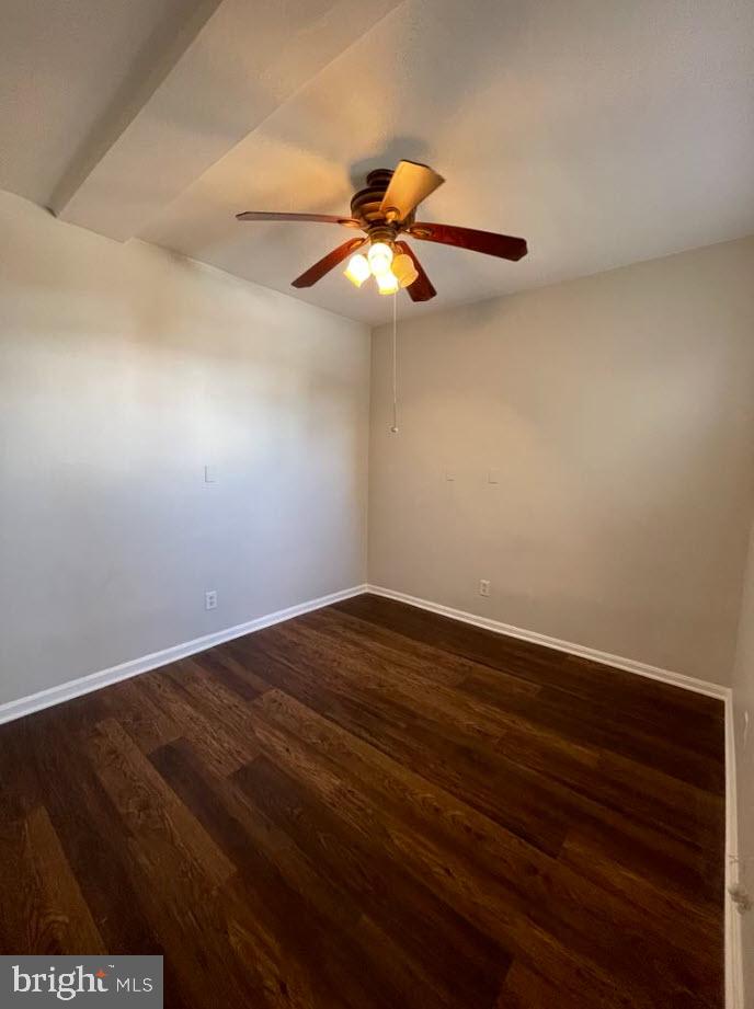 1669 Columbia Road Northwest, Unit 215 Washington, DC 20009 - Photo 20 of 25 a view of an empty room with wooden floor