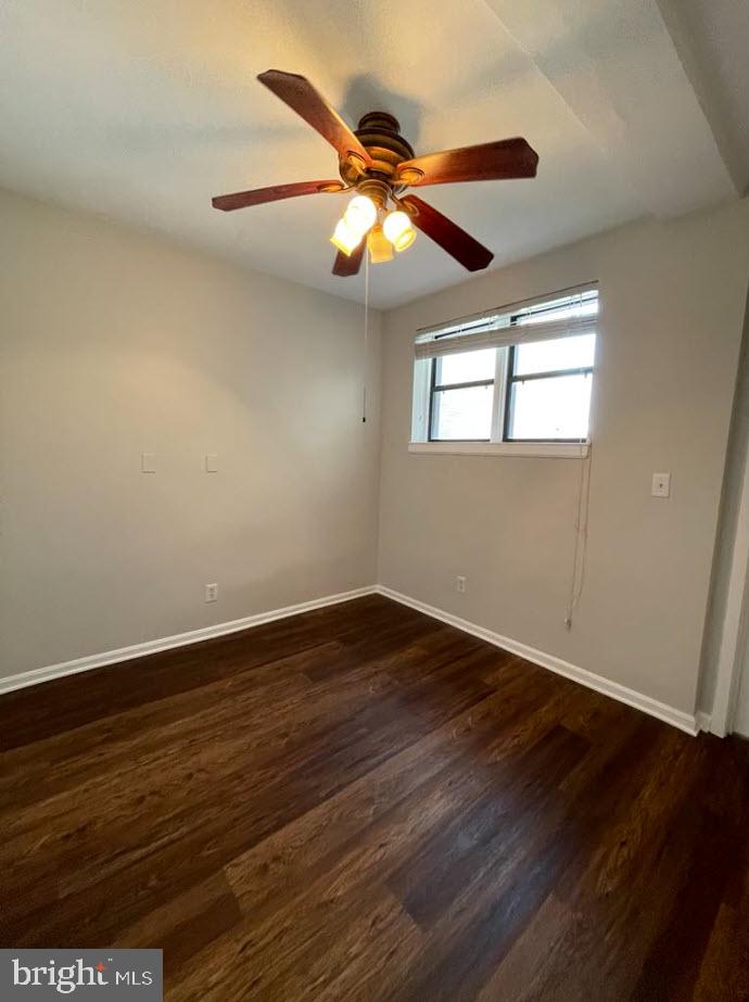1669 Columbia Road Northwest, Unit 215 Washington, DC 20009 - Photo 21 of 25 wooden floor in an empty room with a window