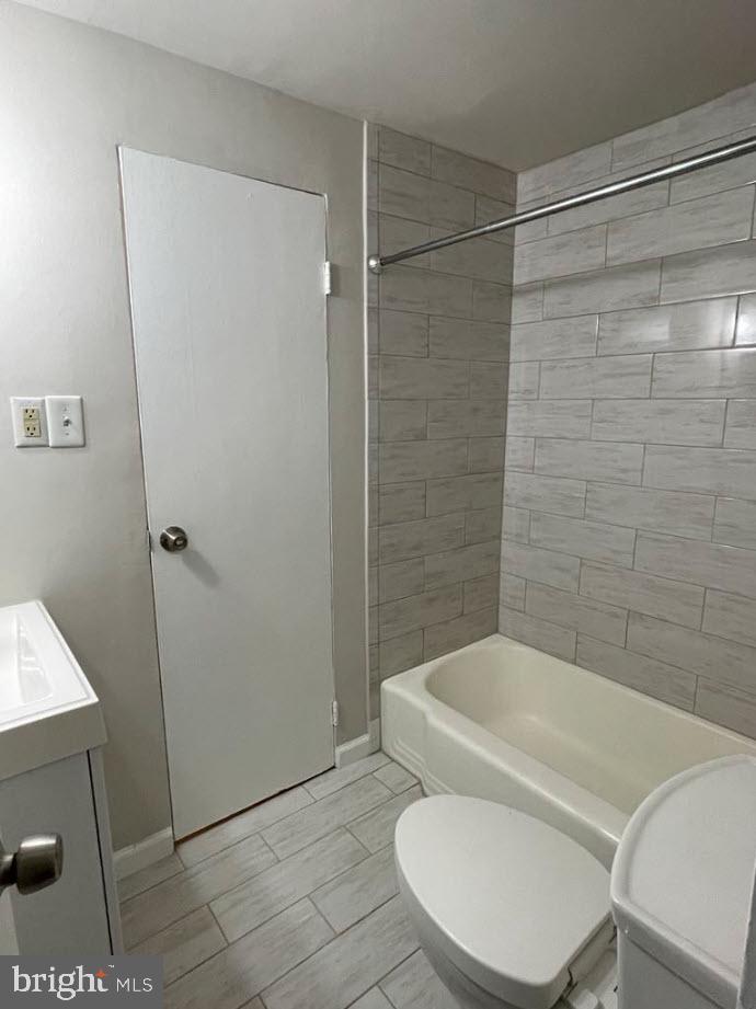 1669 Columbia Road Northwest, Unit 215 Washington, DC 20009 - Photo 24 of 25 a bathroom with a toilet and a shower