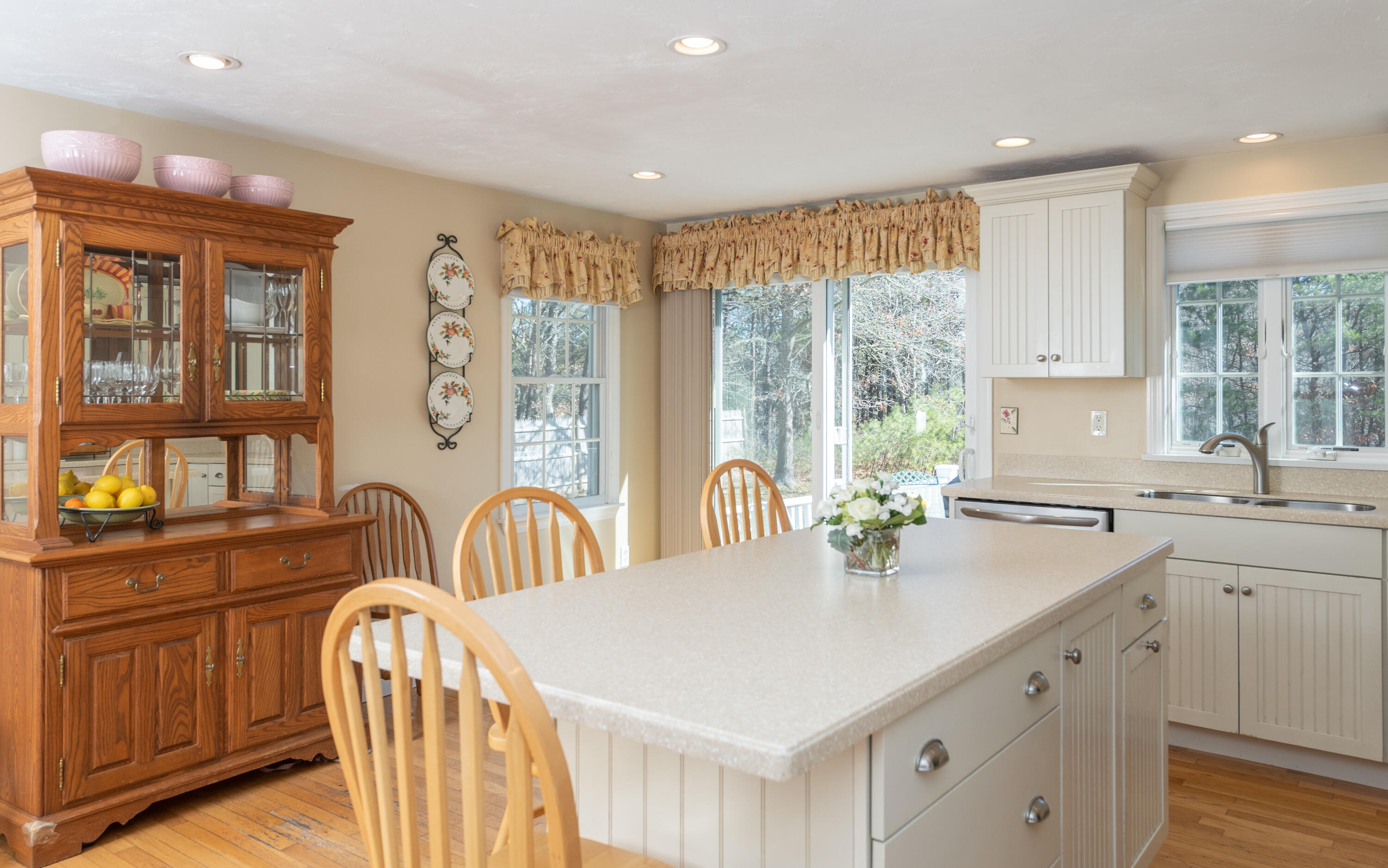 19 Carleton Drive Mashpee, MA 02649 - Photo 15 of 45 a kitchen with stainless steel appliances a sink and cabinets