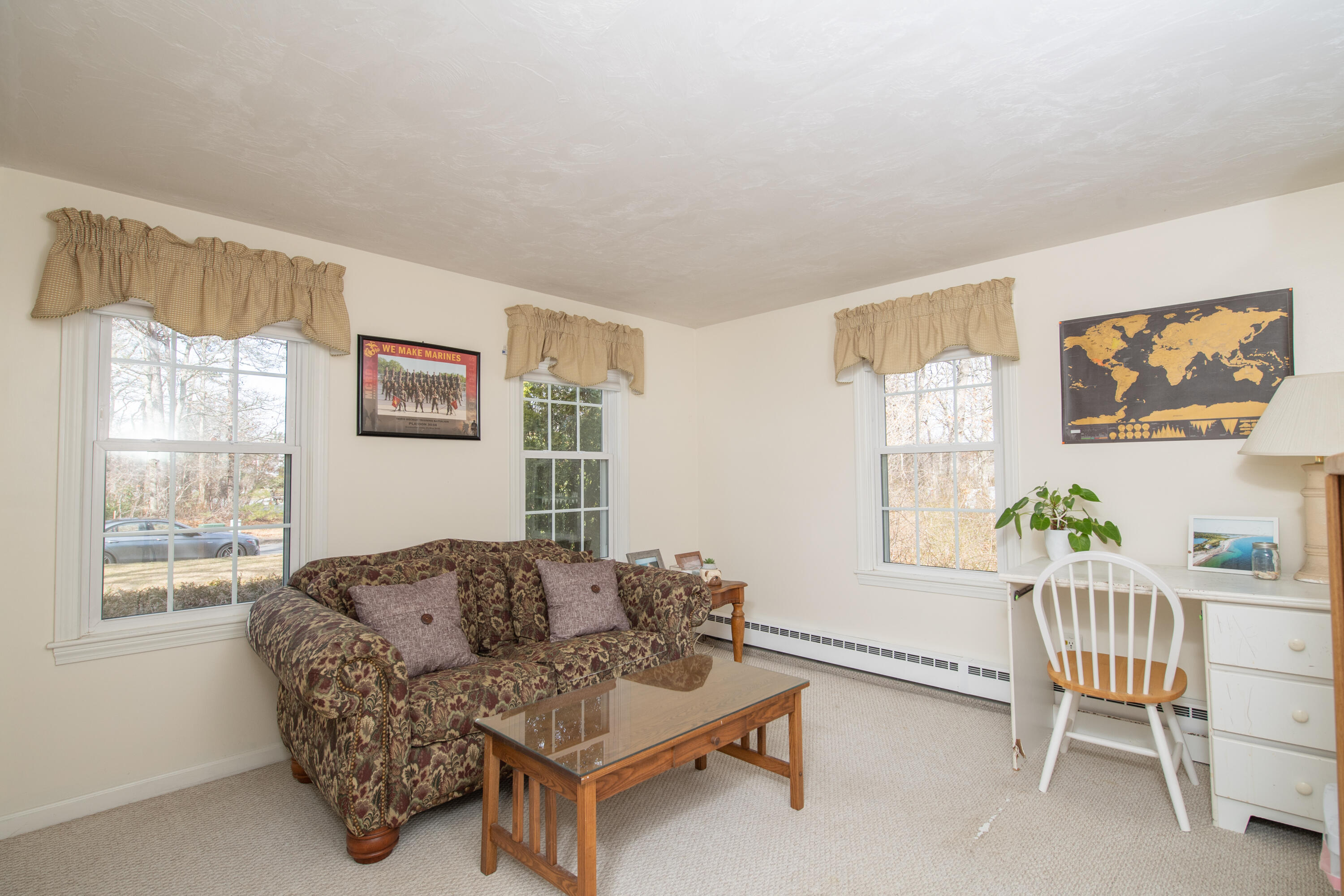19 Carleton Drive Mashpee, MA 02649 - Photo 21 of 45 a living room with furniture and a window