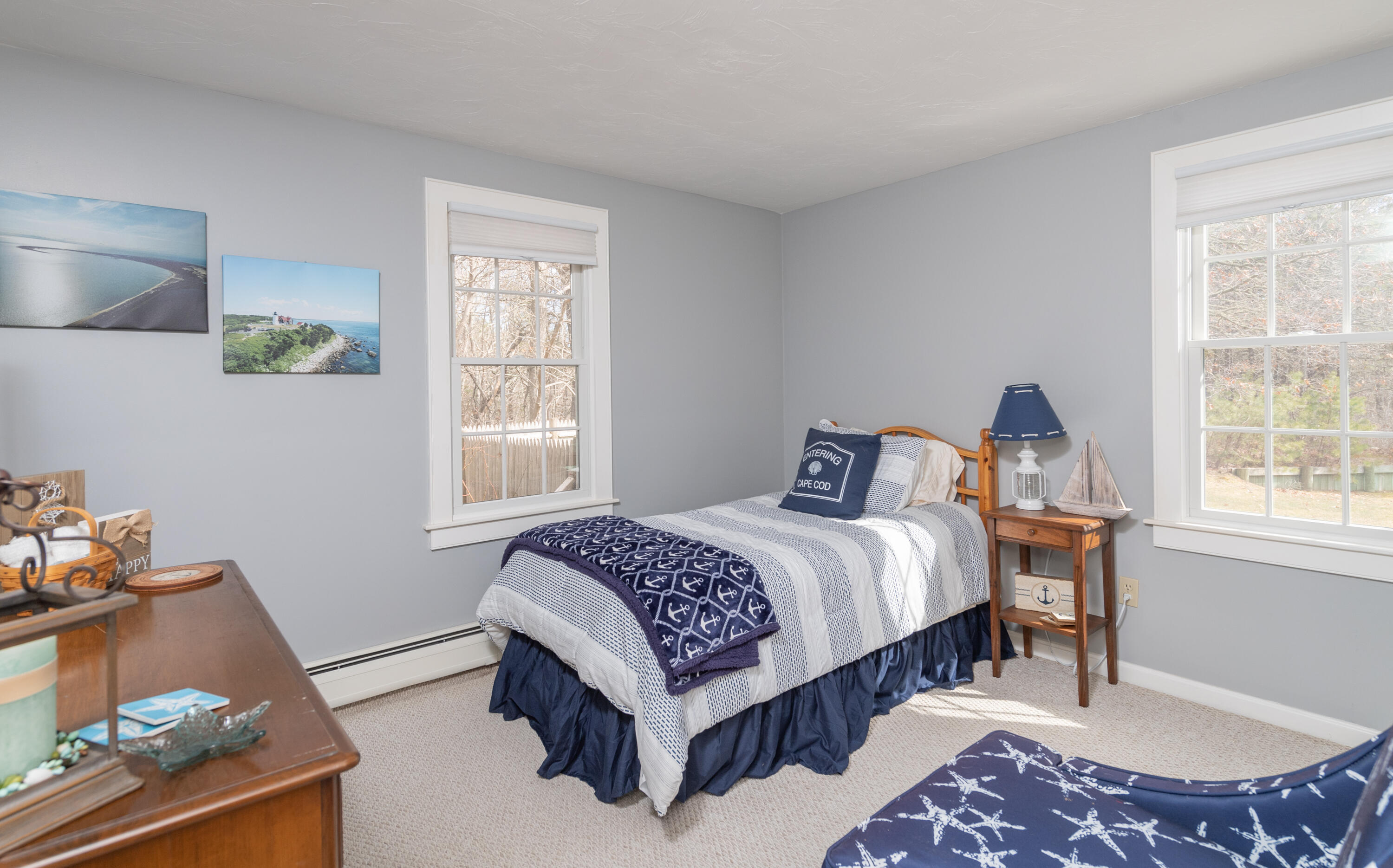 19 Carleton Drive Mashpee, MA 02649 - Photo 23 of 45 a bedroom with a bed and window