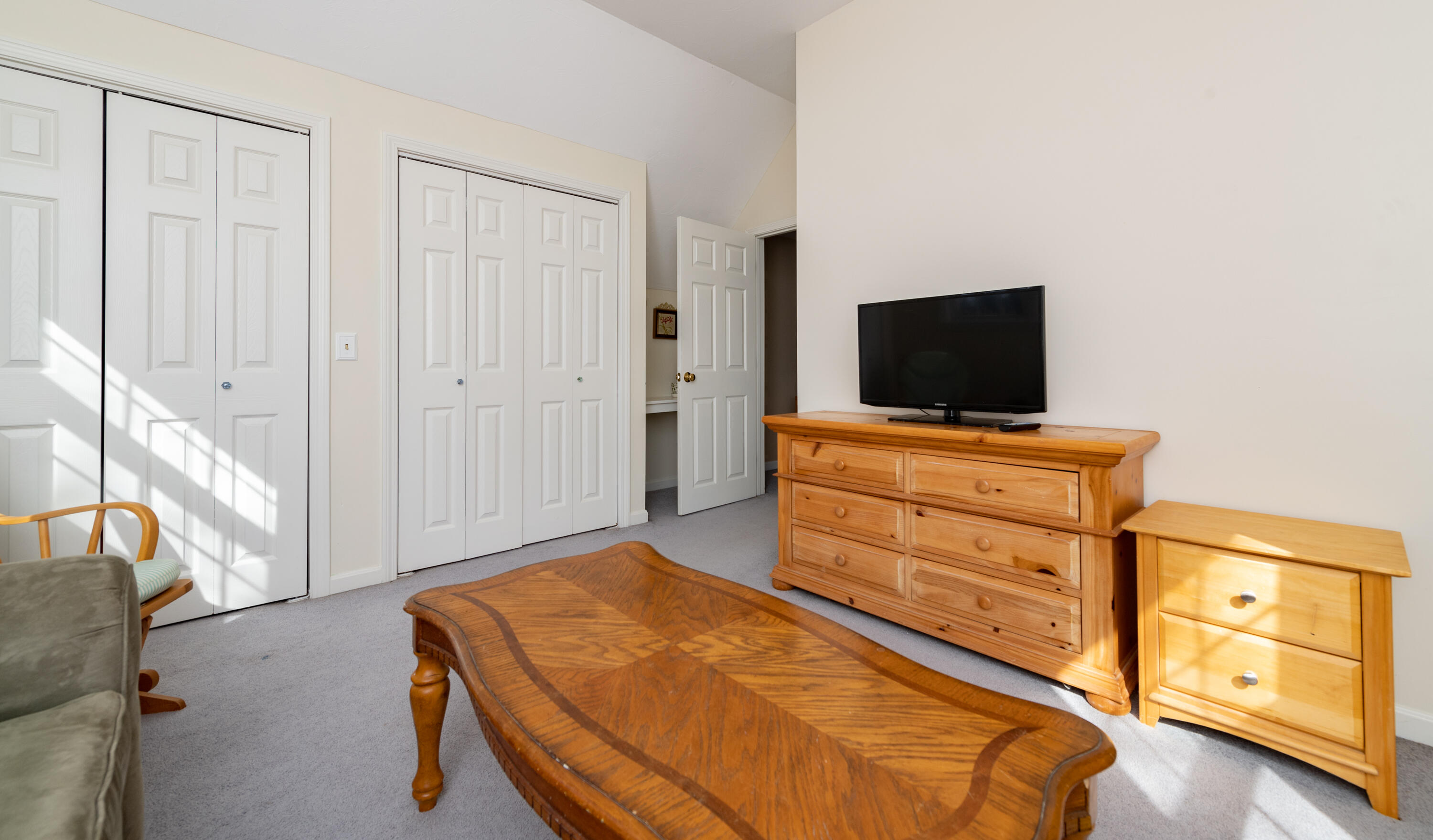 19 Carleton Drive Mashpee, MA 02649 - Photo 32 of 45 a bedroom with a bed and a flat screen tv