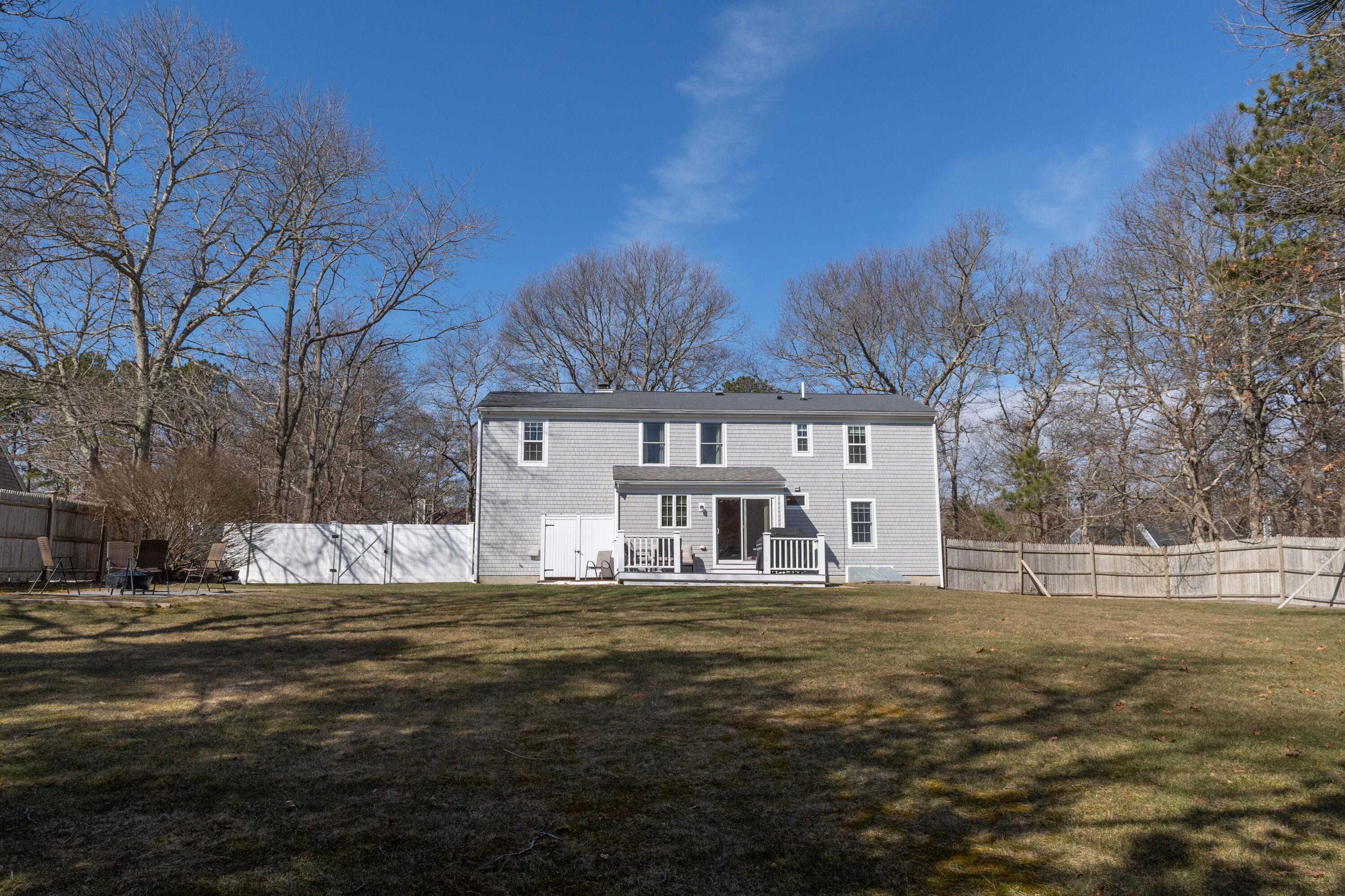 19 Carleton Drive Mashpee, MA 02649 - Photo 4 of 45 a view of a house with a big yard