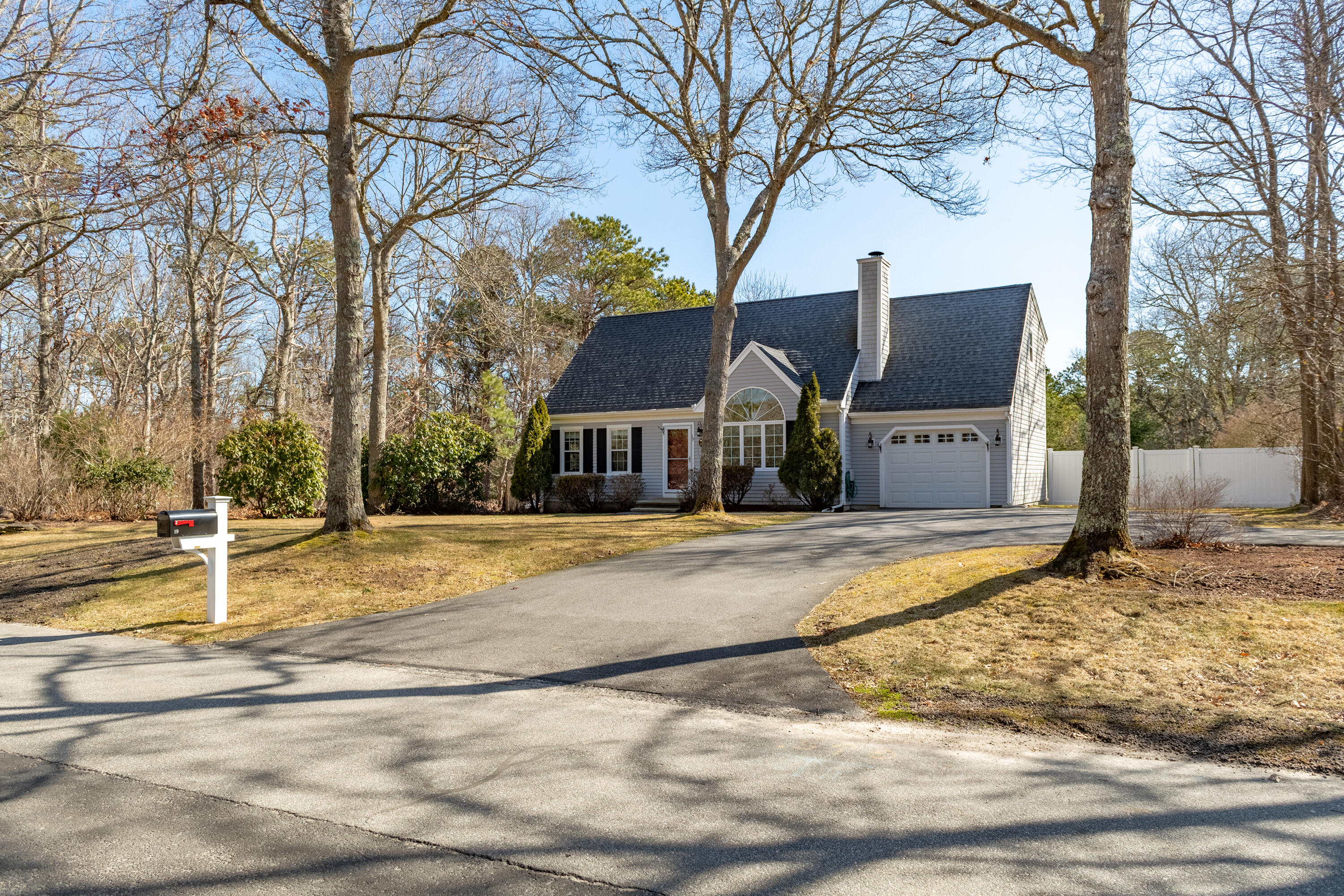 19 Carleton Drive Mashpee, MA 02649 - Photo 43 of 45 a view of a house with snow on the road