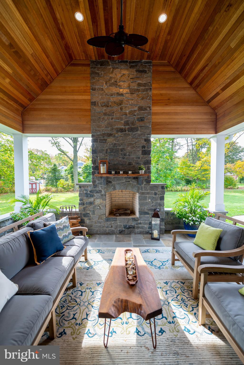 1201 Golf Road Cinnaminson, NJ 08077 - Photo 10 of 33 Outdoor stone fireplace and mahogany ceiling