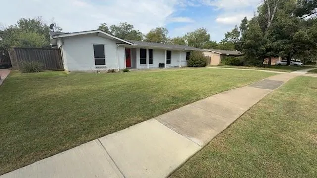 a house view with a garden space