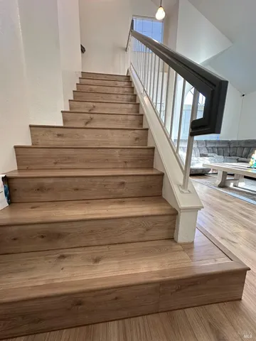 a bathroom with a sink vanity and a mirror