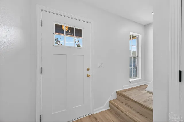 a bathroom with a sink and mirror