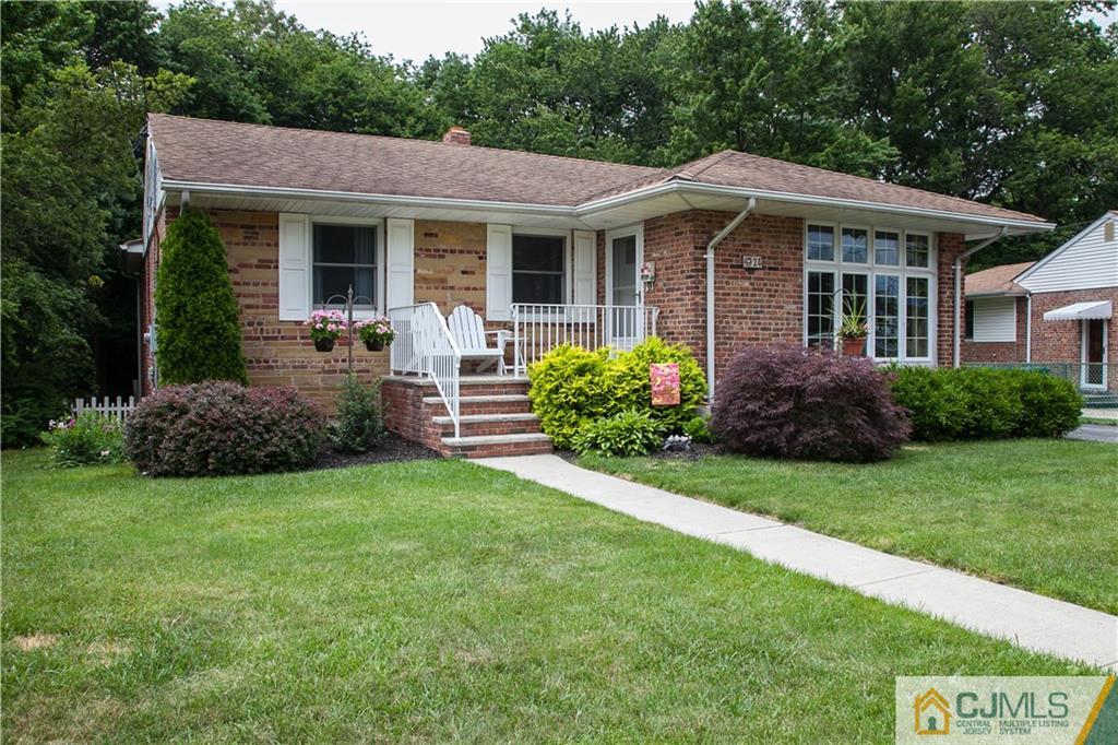 24 Gurley Road Edison, NJ 08817 - Photo 2 of 20 a view of a house with a yard and plants