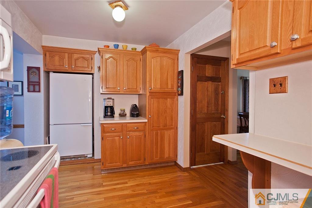 24 Gurley Road Edison, NJ 08817 - Photo 11 of 20 a kitchen with stainless steel appliances a refrigerator and a stove