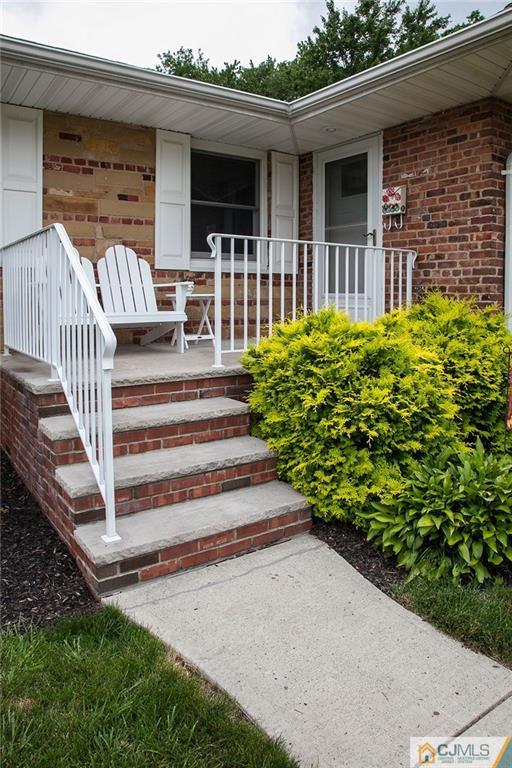 24 Gurley Road Edison, NJ 08817 - Photo 4 of 20 a view of a house with a yard