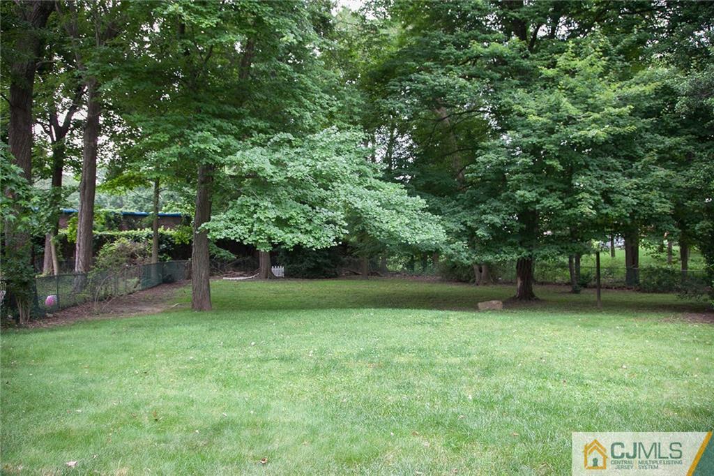 24 Gurley Road Edison, NJ 08817 - Photo 6 of 20 a view of a trees with a big yard