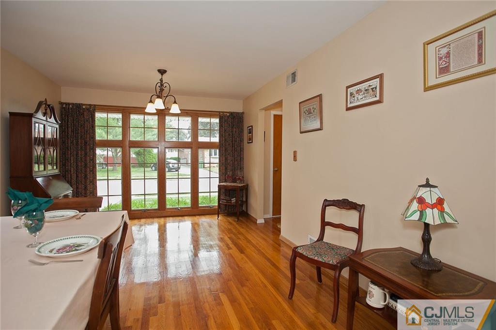 24 Gurley Road Edison, NJ 08817 - Photo 9 of 20 a living room with furniture and a window