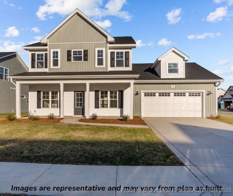 9864 Rockfish Road Raeford, NC 28376 - Photo 2 of 9 a front view of a house with a yard