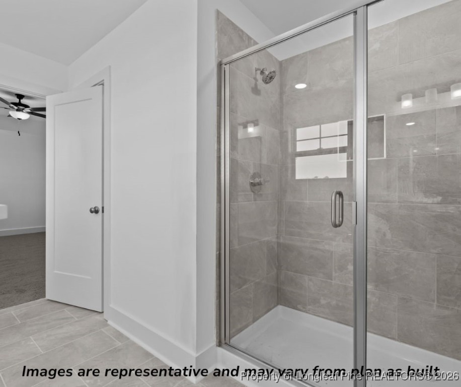 9864 Rockfish Road Raeford, NC 28376 - Photo 4 of 9 a bathroom with a shower