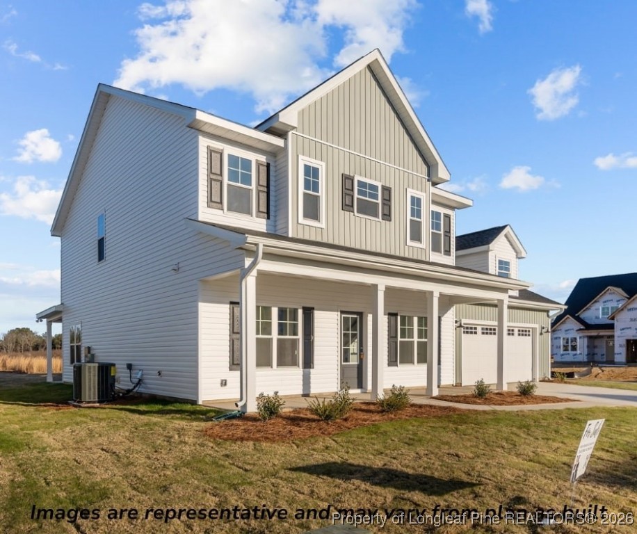 9864 Rockfish Road Raeford, NC 28376 - Photo 8 of 9 a front view of a house with a yard