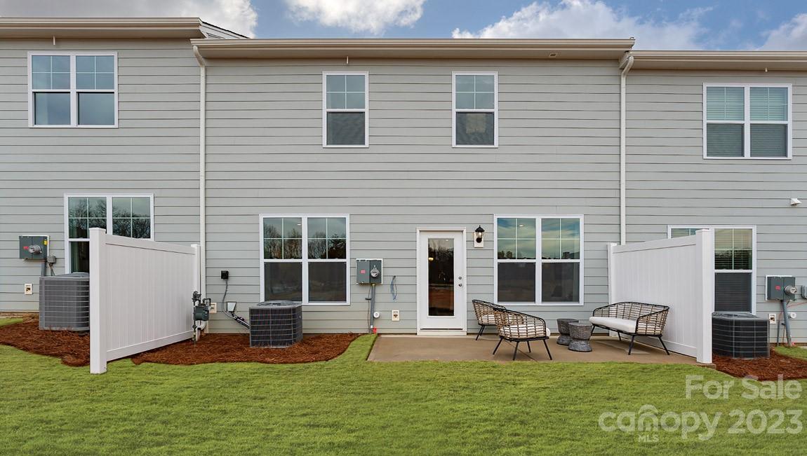 7903 Iron Road Sherrills Ford, NC 28673 - Photo 31 of 41 a view of a house with backyard porch and sitting area