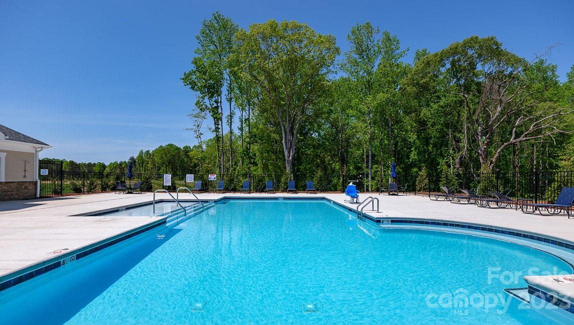 7903 Iron Road Sherrills Ford, NC 28673 - Photo 35 of 41 a view of a swimming pool with lounge chair